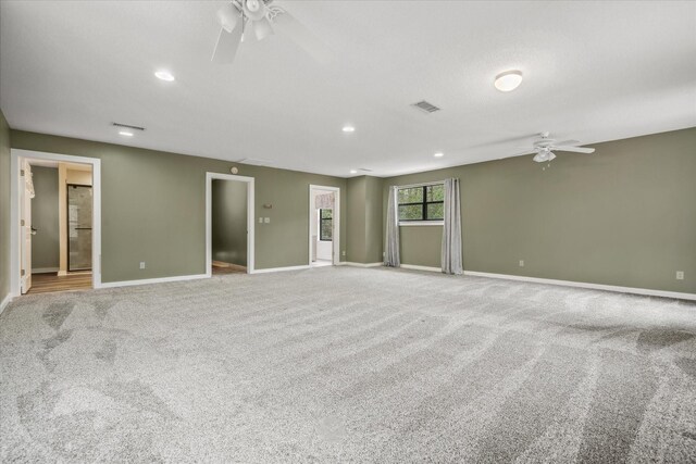 spare room featuring visible vents, baseboards, ceiling fan, carpet, and recessed lighting