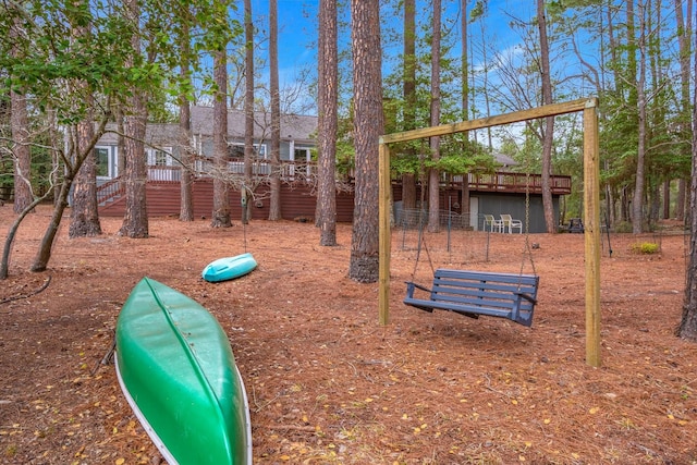 view of jungle gym with a deck