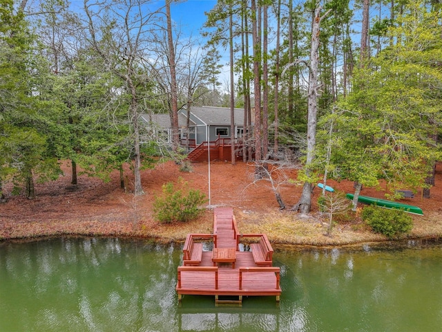 view of dock featuring a deck with water view and stairway