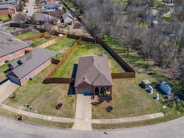 birds eye view of property with a residential view