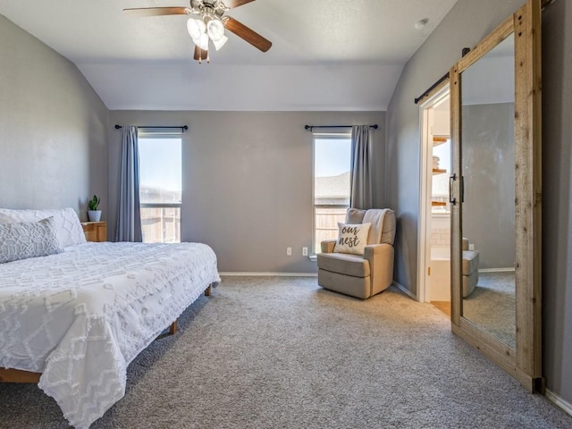 carpeted bedroom featuring vaulted ceiling, multiple windows, and baseboards