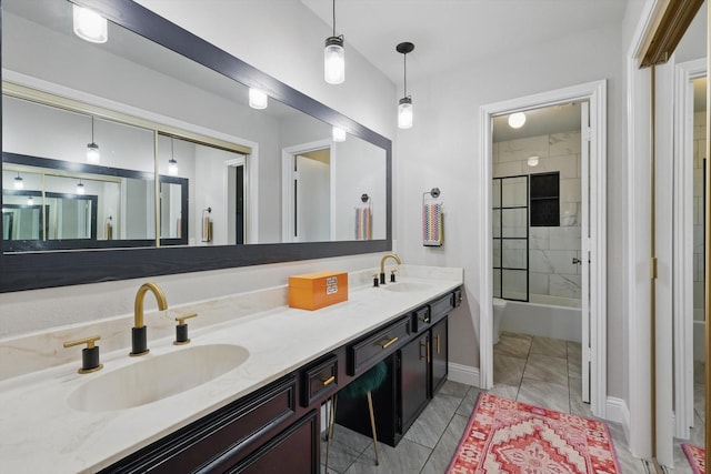 bathroom featuring washtub / shower combination, a sink, baseboards, and double vanity