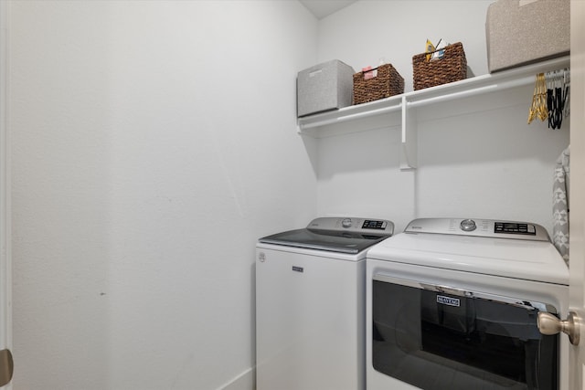 laundry room with laundry area and washer and dryer