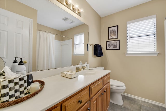 bathroom featuring visible vents, curtained shower, baseboards, toilet, and vanity