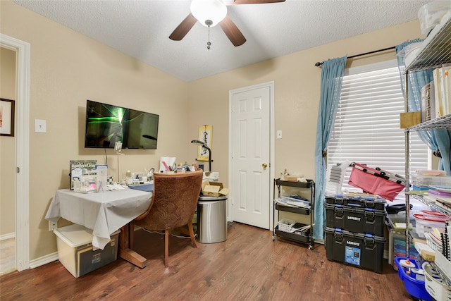 office with baseboards, a textured ceiling, ceiling fan, and wood finished floors