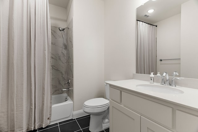 full bathroom with tile patterned flooring, toilet, visible vents, vanity, and shower / bath combo with shower curtain