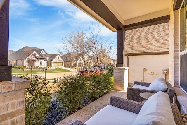 view of patio featuring a residential view