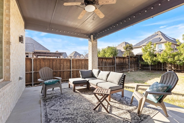 view of patio / terrace with ceiling fan, a fenced backyard, and outdoor lounge area