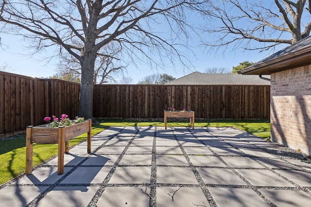 view of patio featuring a fenced backyard