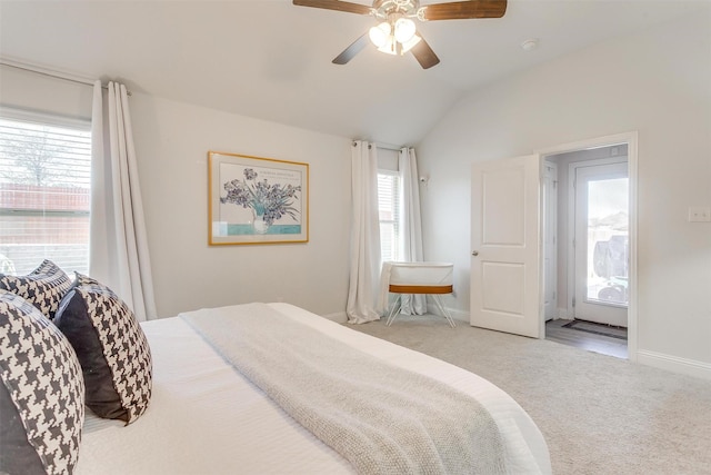 bedroom with lofted ceiling, carpet floors, a ceiling fan, and baseboards