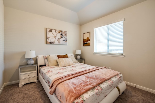 bedroom featuring carpet, baseboards, and vaulted ceiling