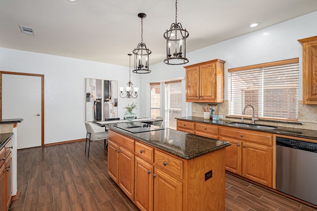 kitchen with black electric stovetop, visible vents, stainless steel dishwasher, wood tiled floor, and a sink