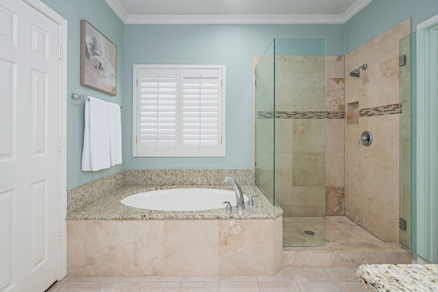 full bathroom featuring a bath, a shower stall, crown molding, and tile patterned floors