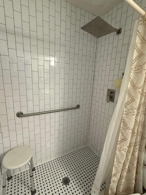 full bath featuring a stall shower