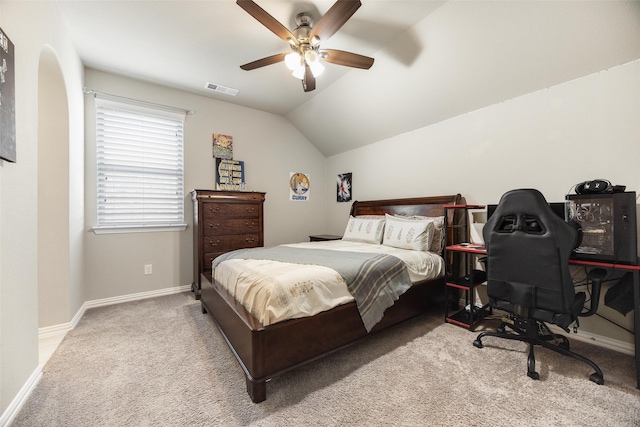 bedroom featuring baseboards, visible vents, lofted ceiling, ceiling fan, and carpet flooring