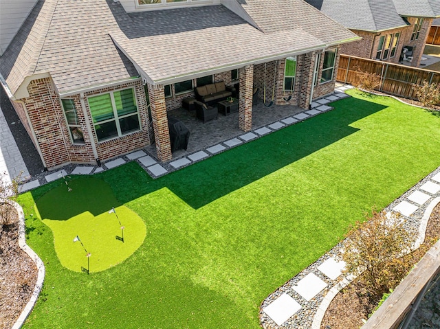 exterior space featuring a patio area and fence