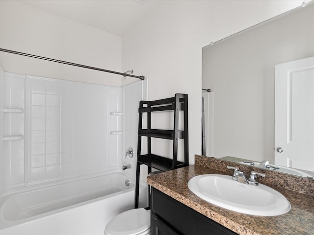 bathroom featuring toilet, shower / bath combination, and vanity