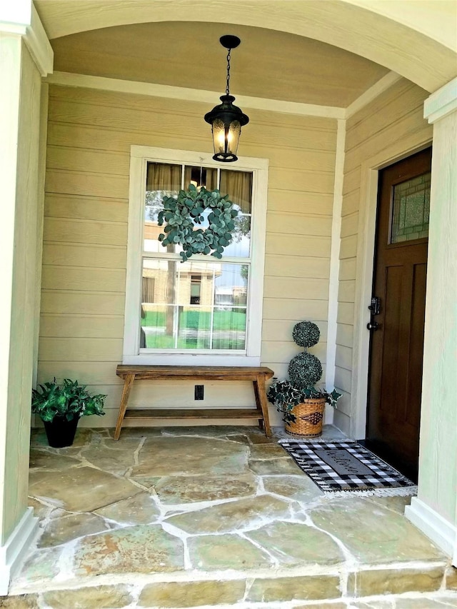 property entrance with a porch