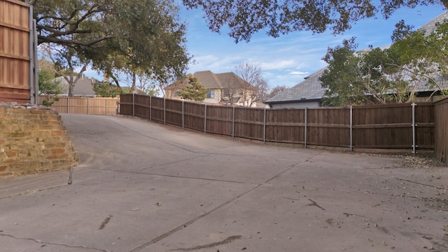 exterior space featuring a patio area and fence