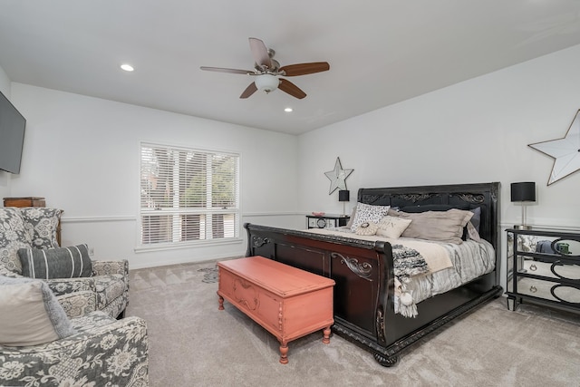 bedroom featuring light carpet, a ceiling fan, and recessed lighting