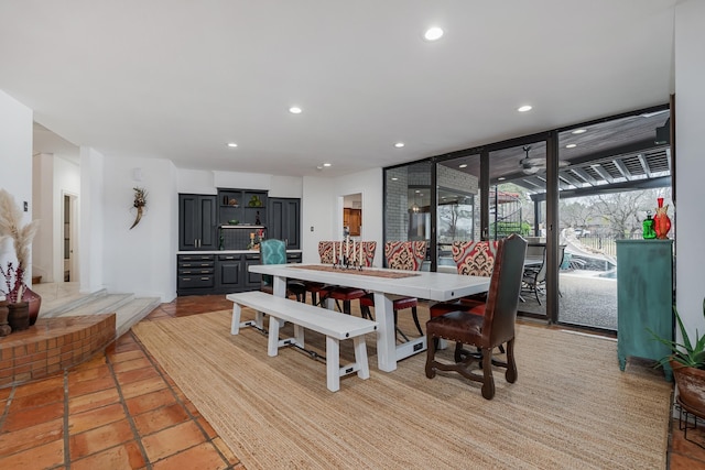 dining room featuring recessed lighting