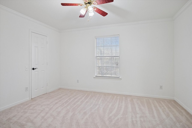 unfurnished room with light carpet, baseboards, a ceiling fan, and crown molding