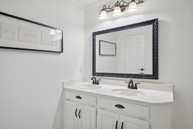 bathroom featuring double vanity, ornamental molding, and a sink