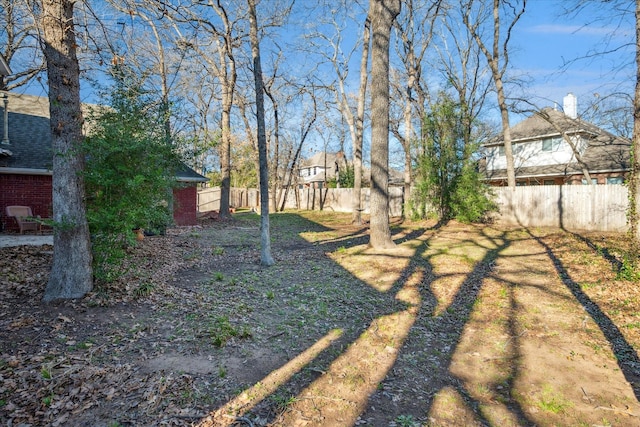 view of yard with fence