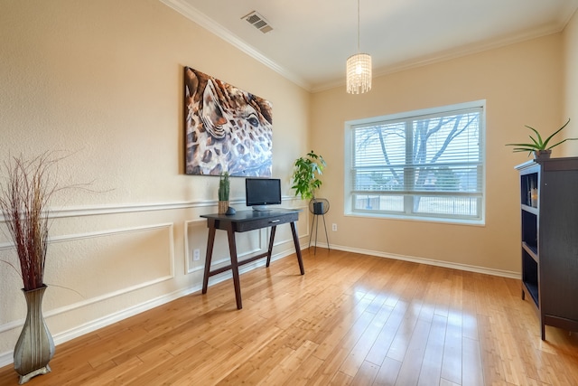 home office featuring crown molding, visible vents, baseboards, light wood-style floors, and an inviting chandelier