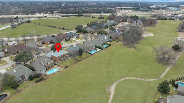 birds eye view of property with a residential view