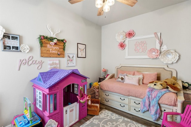 bedroom featuring ceiling fan and wood finished floors