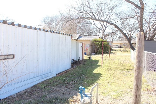 view of yard featuring fence