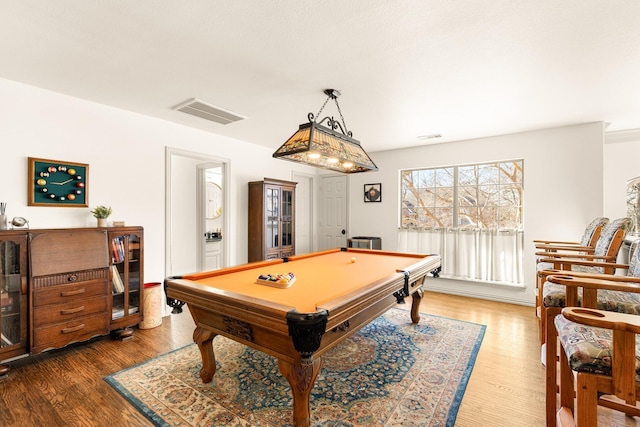 recreation room featuring billiards, wood finished floors, and visible vents