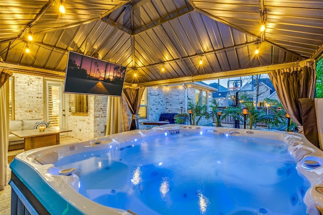 view of swimming pool featuring a gazebo