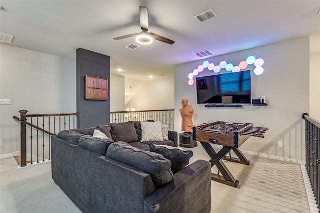 carpeted living room featuring ceiling fan and visible vents