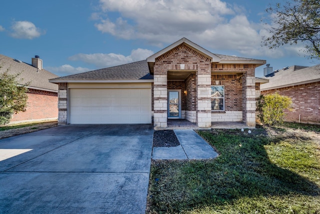 view of front of property featuring a garage, driveway, a shingled roof, stone siding, and brick siding