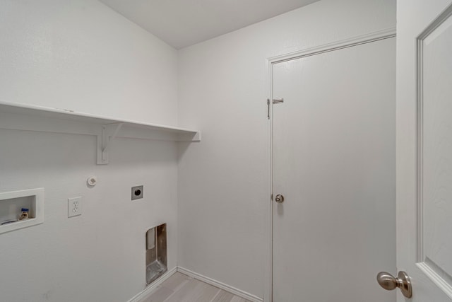 washroom featuring laundry area, gas dryer hookup, hookup for a washing machine, and electric dryer hookup