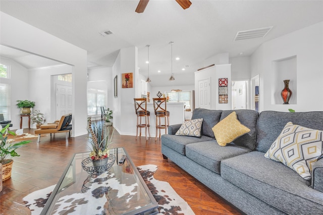 living room featuring ceiling fan, wood finished floors, visible vents, and recessed lighting