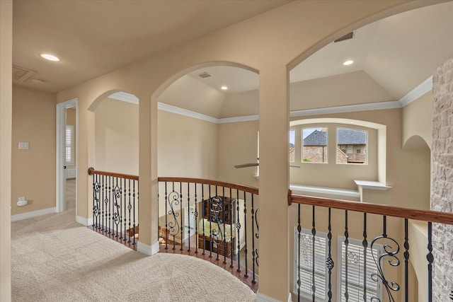 corridor featuring lofted ceiling, carpet, visible vents, and recessed lighting