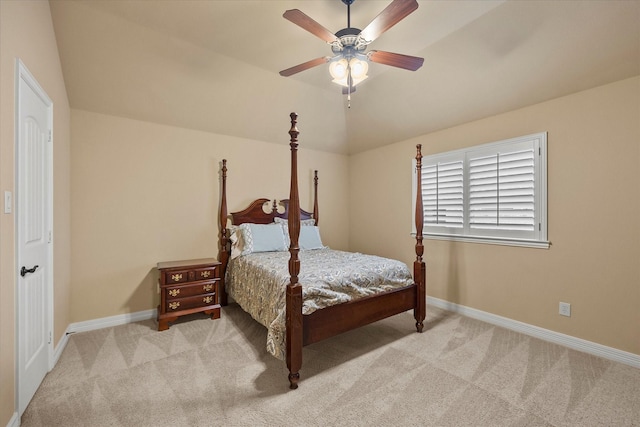 bedroom featuring baseboards, ceiling fan, and carpet
