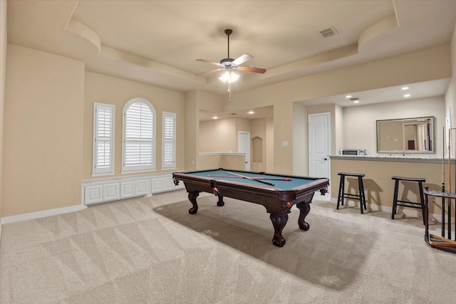 recreation room with billiards, ceiling fan, light carpet, and a tray ceiling
