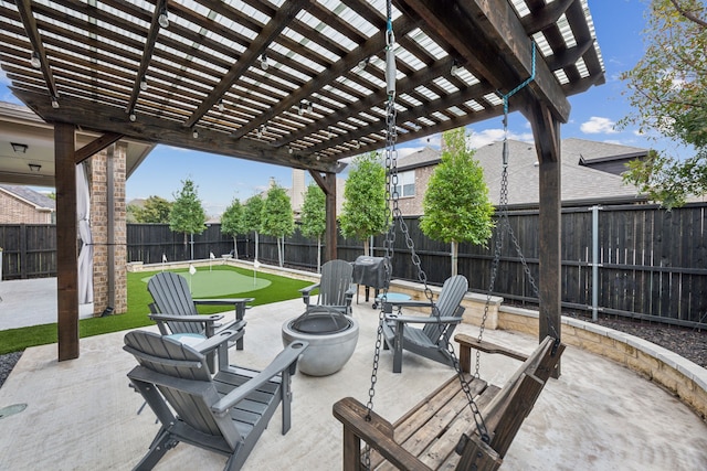 view of patio / terrace with a fenced backyard, a fire pit, and a pergola