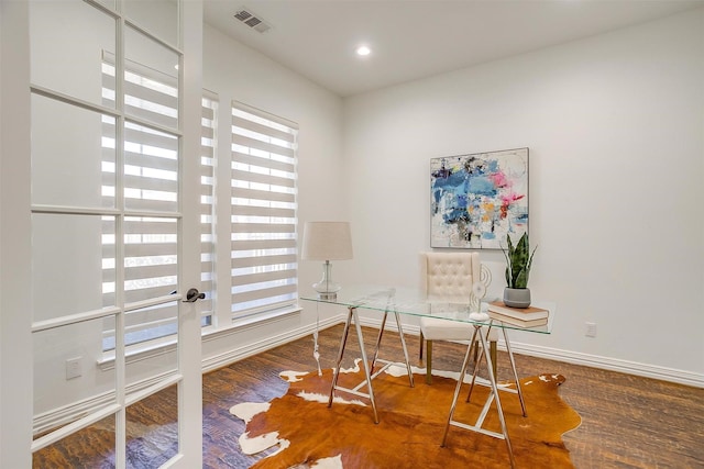 home office featuring baseboards, visible vents, wood finished floors, and recessed lighting