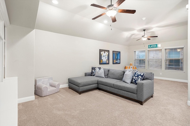 living area with lofted ceiling, light colored carpet, baseboards, and recessed lighting