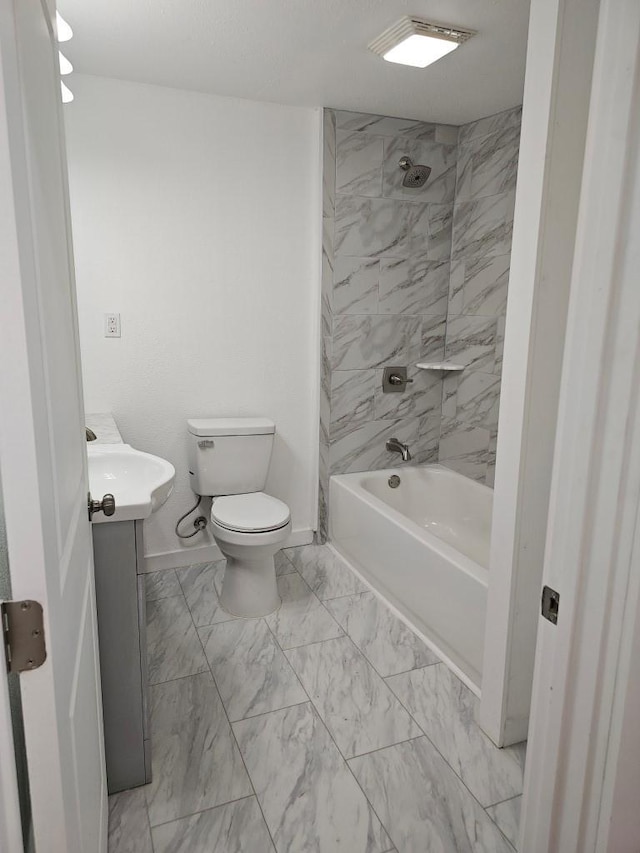 bathroom with baseboards, toilet, shower / tub combination, marble finish floor, and vanity