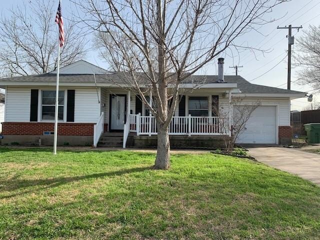 ranch-style house with covered porch, a garage, brick siding, driveway, and a front lawn