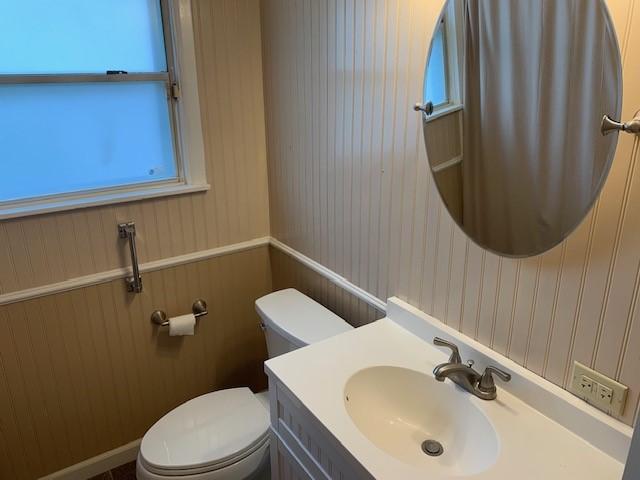 bathroom with vanity and toilet