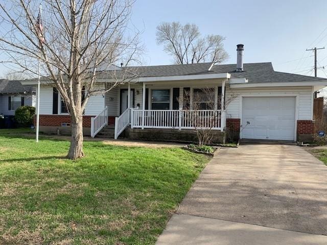 single story home featuring brick siding, concrete driveway, an attached garage, covered porch, and a front yard