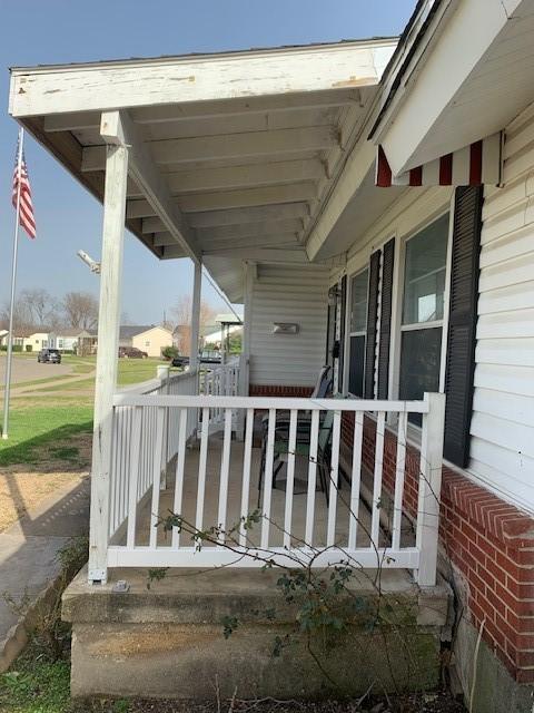 wooden deck featuring a porch