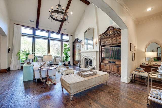 140 Manor Dr, Heath, TX 75032 - living room with high vaulted ceiling, a chandelier, baseboards, a fireplace, and wood finished floors